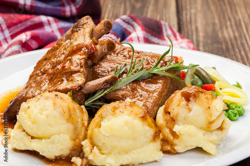 Photo: Pork spareribs served with mashed potatoes Pork spareribs served with mashed potatoes