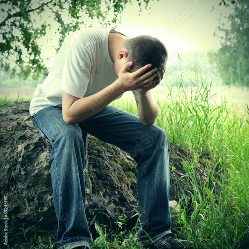 Photo: Sad Teenager outdoor Sad Teenager outdoor