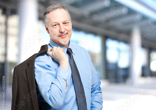 Photo: Smiling businessman outdoor Smiling businessman outdoor
