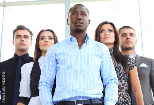 Photo: Group portrait of a professional business team Group portrait of a professional business team