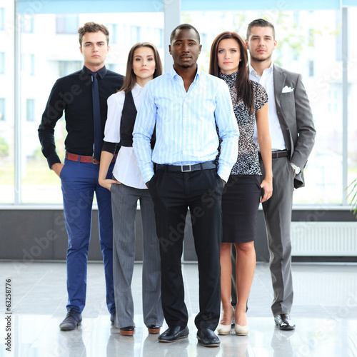 Photo: Group portrait of a professional business team Group portrait of a professional business team