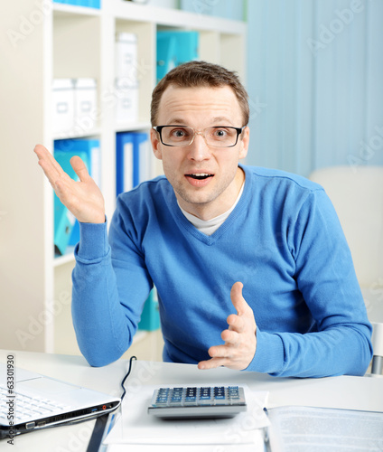 Photo: businessman in the office businessman in the office