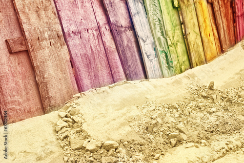 Photo: Vintage wooden fence in rainbow colors Vintage wooden fence in rainbow colors