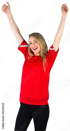 Photo: Cheering football fan in red Cheering football fan in red