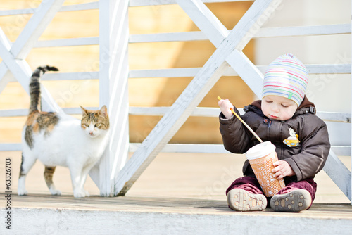 Photo: baby boy and cat baby boy and cat