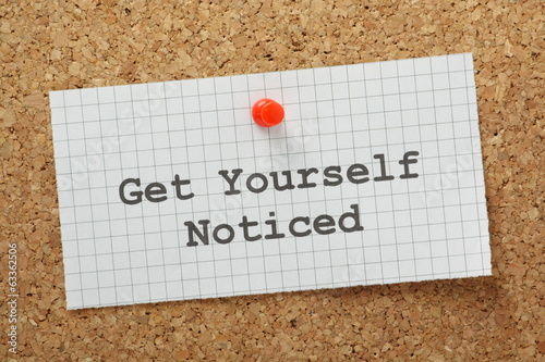 Photo: The phrase Get Yourself Noticed on a cork notice board The phrase Get Yourself Noticed on a cork notice board