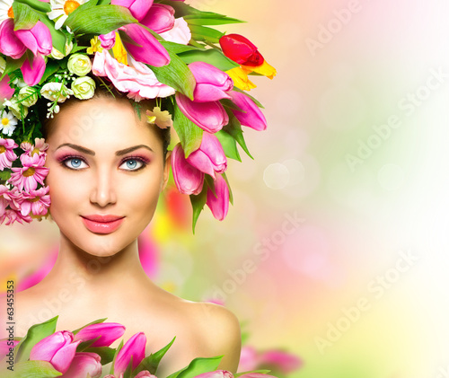 Photo: Beauty summer model girl with colorful flowers hairstyle Beauty summer model girl with colorful flowers hairstyle