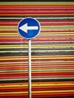 road-sign on multicolored strips background road-sign on multicolored strips background