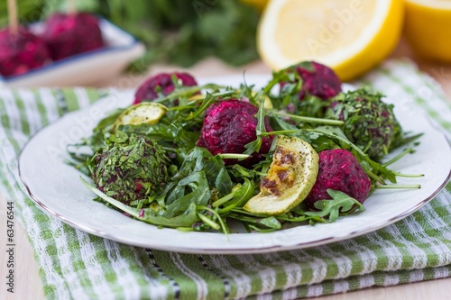 Photo: Fresh summer salad with arugula, zucchini, balls of beet Fresh summer salad with arugula, zucchini, balls of beet