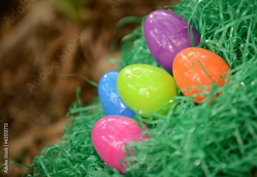 Photo: plastic easter eggs in fake grass plastic easter eggs in fake grass