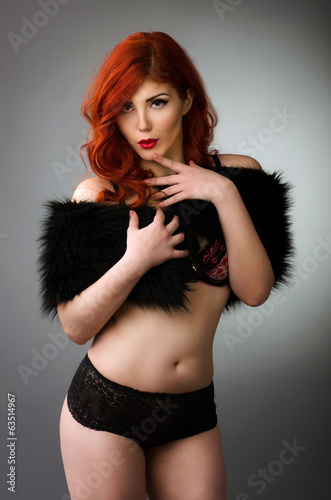 Photo: redhead woman posing in sexy lingerie redhead woman posing in sexy lingerie