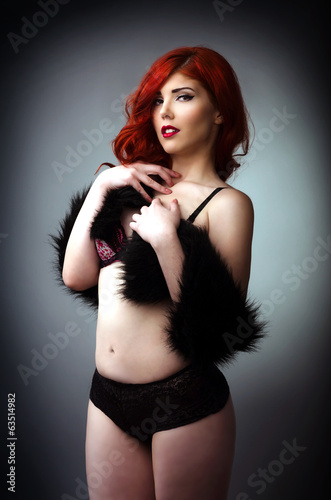 Photo: Sensual young woman posing in sexy lingerie Sensual young woman posing in sexy lingerie