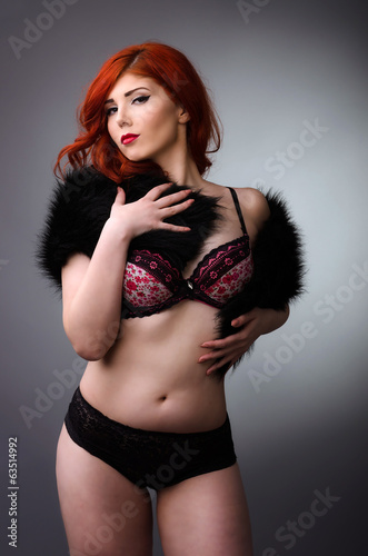 Photo: Confident curvy woman posing in lingerie Confident curvy woman posing in lingerie