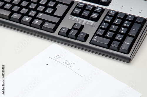 Photo: keyboard and to do´s list keyboard and to do´s list