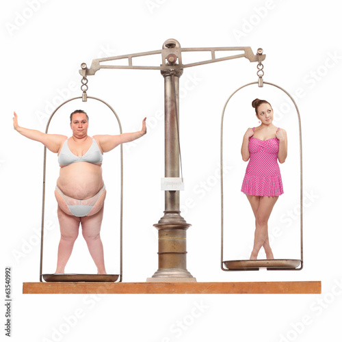 Photo: Overweight and slim. Balance scale with two young women. Overweight and slim. Balance scale with two young women.