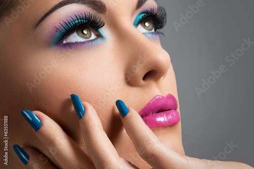 Photo: Beautiful girl with colorful makeup Beautiful girl with colorful makeup
