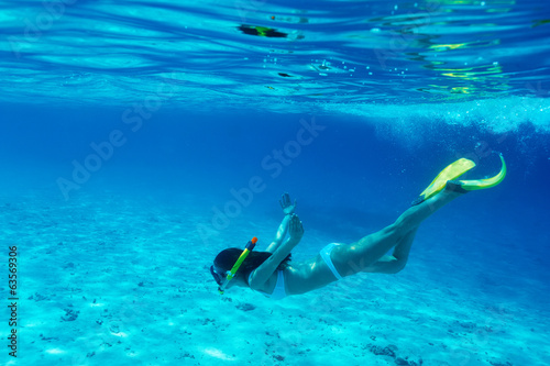 Photo: Woman with mask snorkeling Woman with mask snorkeling