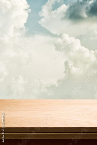 Photo: Empty wooden table top for product placement Empty wooden table top for product placement