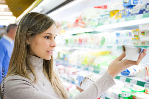 Photo: Woman shopping at the supermarket Woman shopping at the supermarket