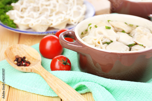 Photo: Meat dumplings - russian boiled pelmeni close up Meat dumplings - russian boiled pelmeni close up