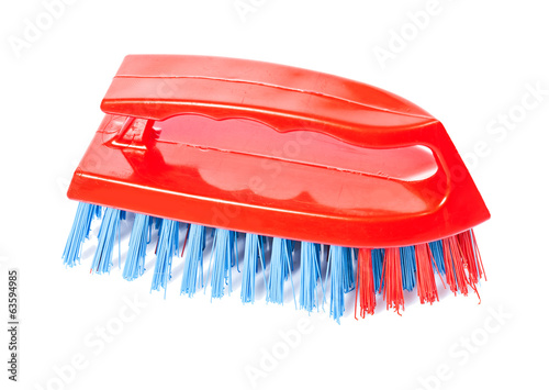 Photo: red kitchen scrubbrush isolated on white background red kitchen scrubbrush isolated on white background