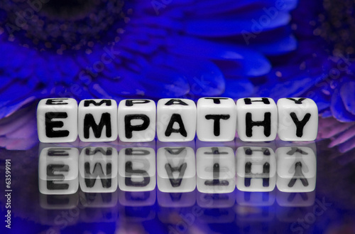 Photo: Empathy text with blue flowers Empathy text with blue flowers