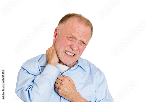 Photo: Elderly man having neck strain, pain and sprain Elderly man having neck strain, pain and sprain