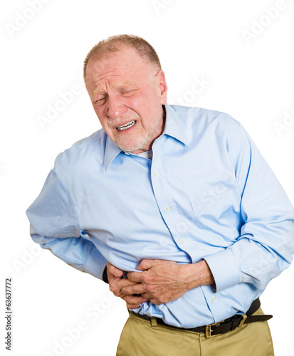 Photo: Senior, old man having right-sided abdominal pain Senior, old man having right-sided abdominal pain