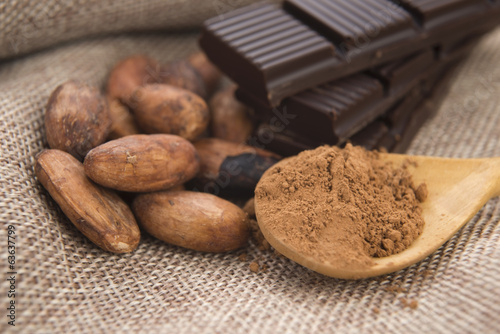 Photo: Cocoa (cacao) beans with chocolate Cocoa (cacao) beans with chocolate