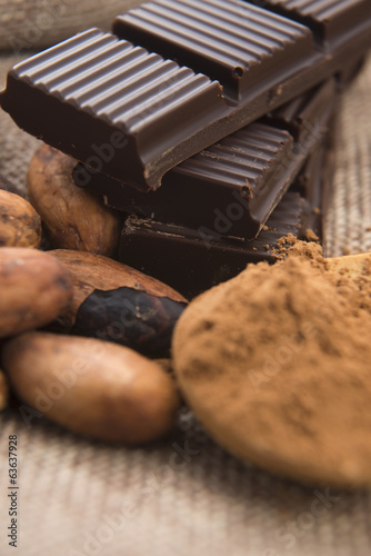 Photo: Cocoa (cacao) beans with chocolate Cocoa (cacao) beans with chocolate