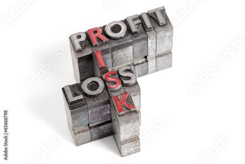 Photo: Profit Loss and Risk letterpress concept Profit Loss and Risk letterpress concept