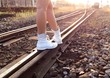 Walking along the railroad in evening Walking along the railroad in evening