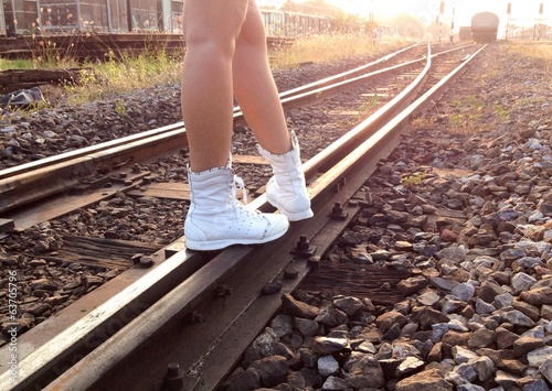 Instant Collection: Walking along the railroad in evening Walking along the railroad in evening