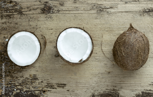 Photo: Coconut on wooden background Coconut on wooden background