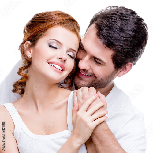 Photo: Closeup portrait of beautiful smiling couple. Closeup portrait of beautiful smiling couple.