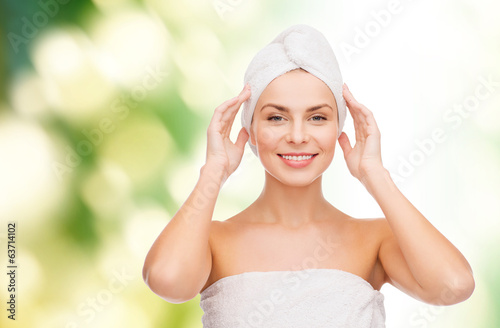 Photo: beautiful woman in towel beautiful woman in towel