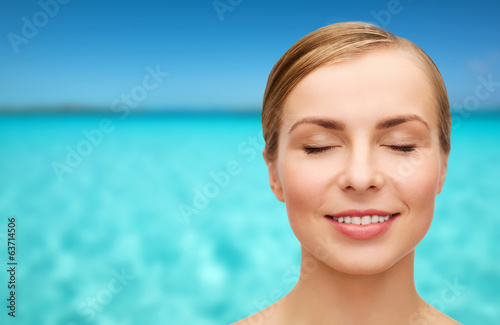 Photo: face of beautiful woman with closed eyes face of beautiful woman with closed eyes
