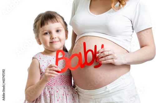 Photo: child and her pregnant mother child and her pregnant mother