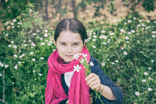 Photo: Young girl in a forest Young girl in a forest