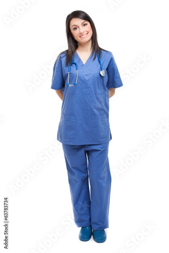 Photo: Friendly nurse isolated on white full length Friendly nurse isolated on white full length
