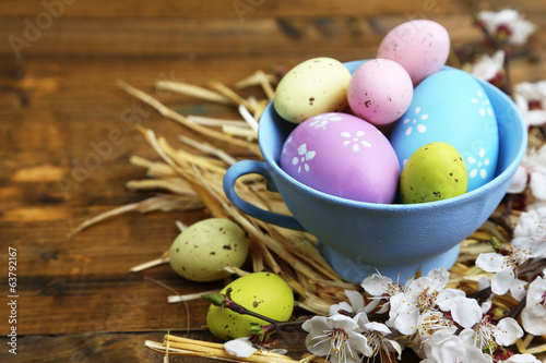 Photo: Easter composition with flowering branches Easter composition with flowering branches