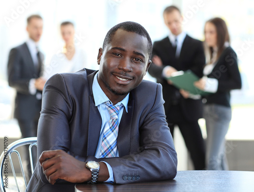 Photo: Portrait of smiling African American business man Portrait of smiling African American business man