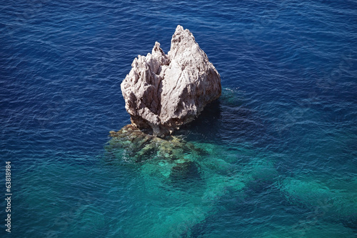 Photo: Rock in the sea. Rock in the sea.
