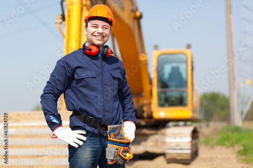 Photo: Worker in a construction site Worker in a construction site