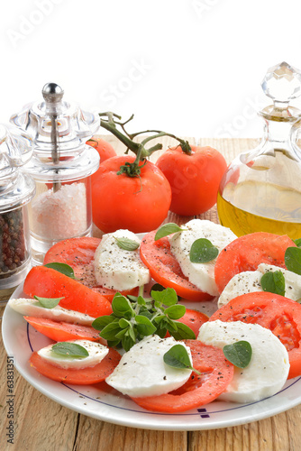 Photo: caprese, pomodori e mozzarella verticale caprese, pomodori e mozzarella verticale