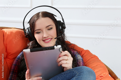 Photo: Lifestyle. Attractive girl with tablet Lifestyle. Attractive girl with tablet
