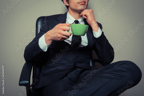 Photo: Businessman drinking coffee Businessman drinking coffee