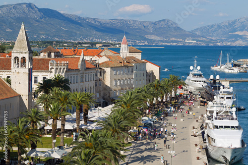 Photo: Tourists visit Old Town Trogir in Croatia Tourists visit Old Town Trogir in Croatia