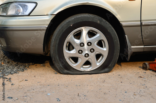 Photo: Flat tire on car Flat tire on car