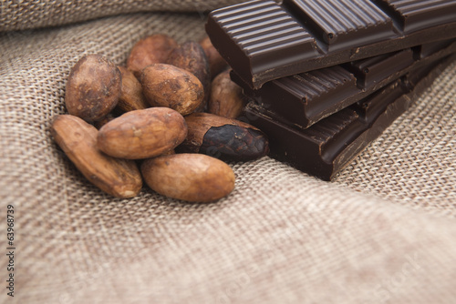 Photo: Cocoa (cacao) beans with chocolate Cocoa (cacao) beans with chocolate